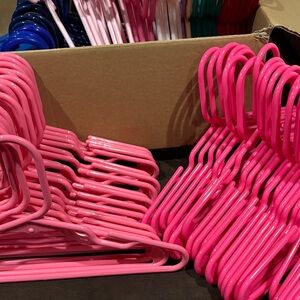 Hues of Pinks, Blues and other colors-Plastic Children’s Hangers.